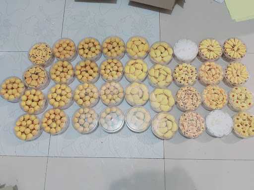 Ibu Hj. Ai Kue 7