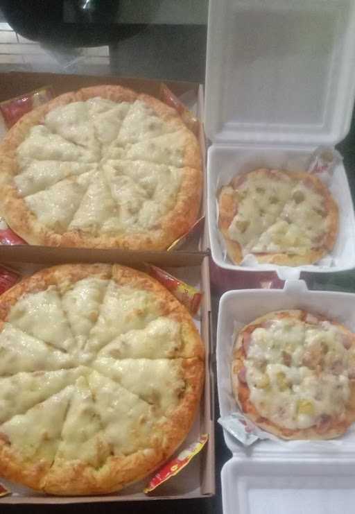 Rumah Pizza Ummy 7