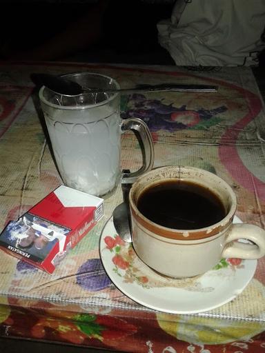 KARABAN,MAN IS COFFE