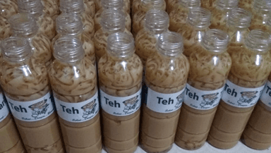 TEH TARIK TJAP TIGA DAUN