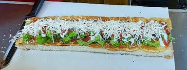 ROTI JOHN MBLUDAK