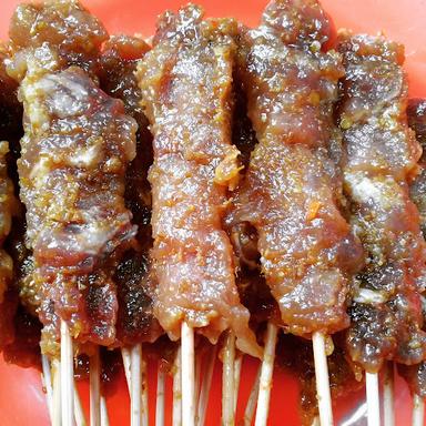 SATE MAKNYUSS (SM)