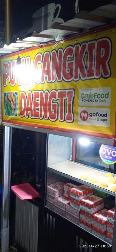 PUTU CANGKIR DAENGTI