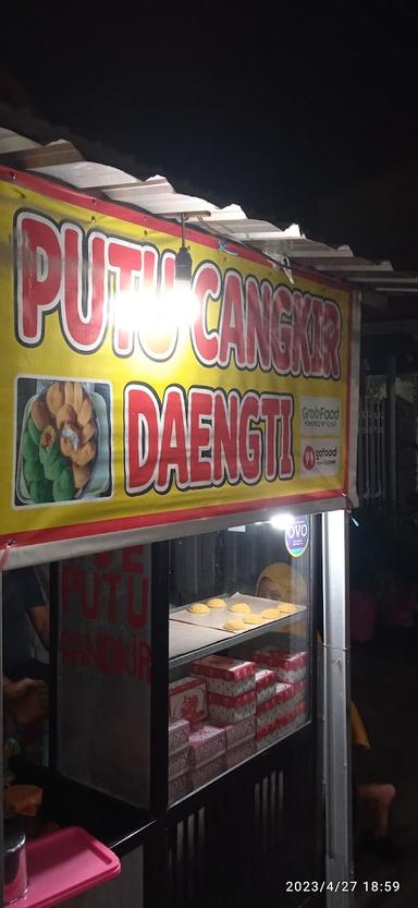 PUTU CANGKIR DAENGTI