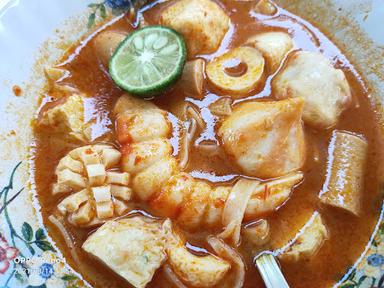 TOMYAM TRIVINA