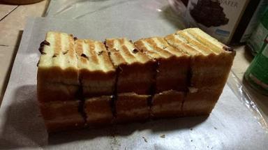 ROTI BAKAR DAN SUSU SEGAR NUMANI