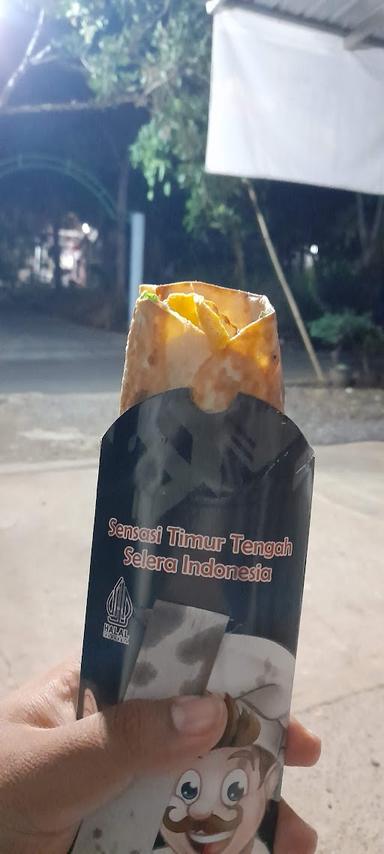 https://horego-prod-outlets-photos.s3.ap-southeast-3.amazonaws.com/horego.com/mijen/restaurant/san-s-kebab-cab-jatisari/review/thumbnail/af1qipmo8vy-t52prmagkyul28vg8ssjm7zcne61vtpk.jpg