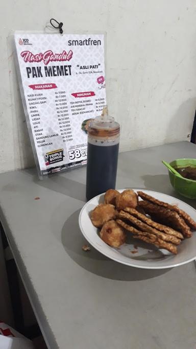 https://horego-prod-outlets-photos.s3.ap-southeast-3.amazonaws.com/horego.com/semarang-timur/restaurant/nasi-gandul-pak-memet/review/thumbnail/af1qippao85dg0fxazwcrtvoxbh7kcfbe76gsapggfww.jpg